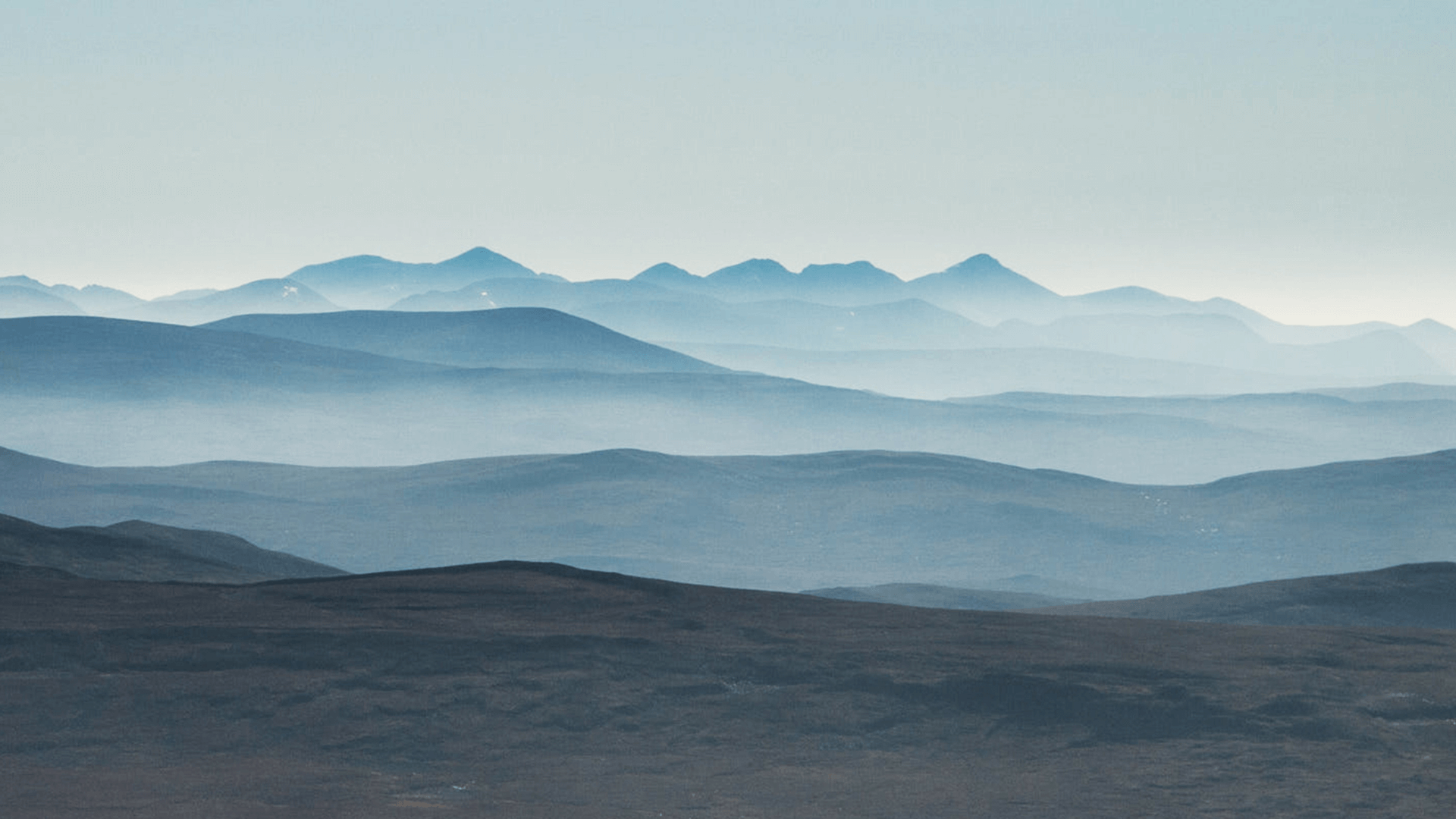 Calm layered mountain landscape representing the characteristics of an empath.